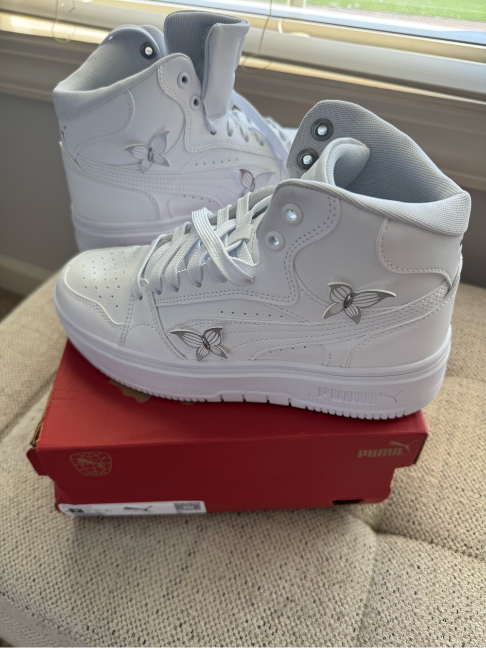 Puma Women’s White High-Top Sneakers with Silver Butterfly Details